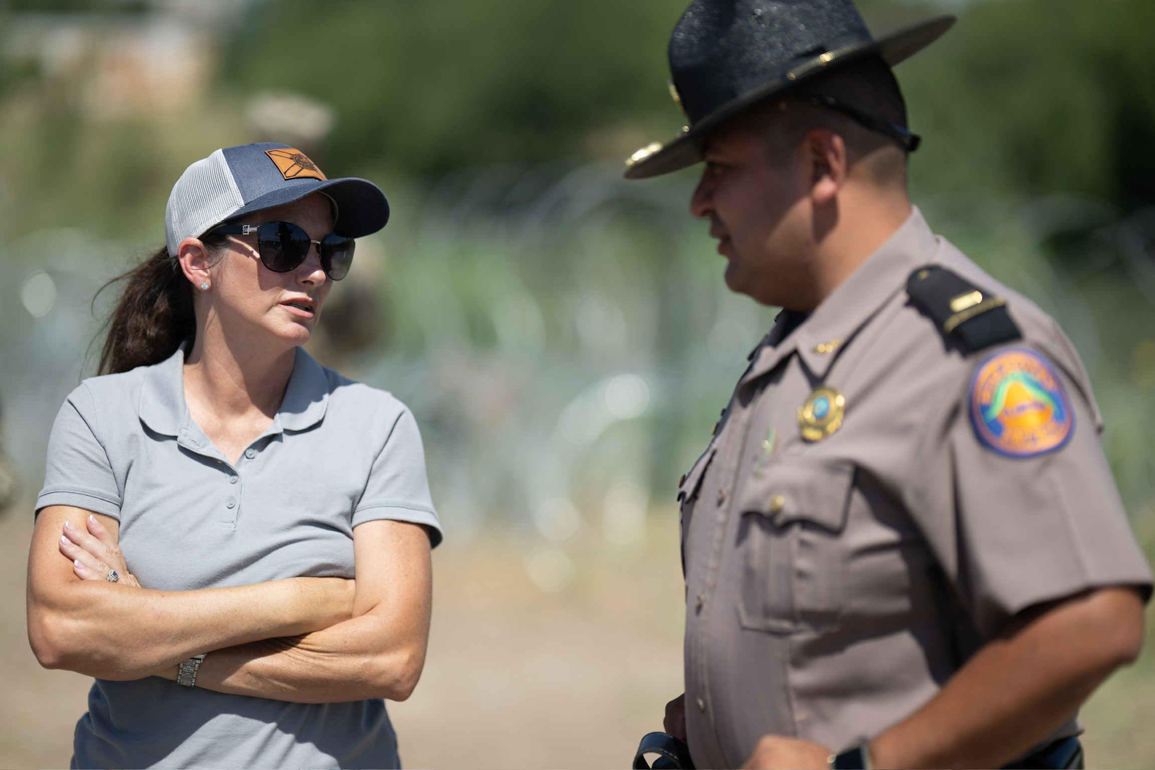 Michelle Salzman with a Florida state trooper at the southern border.